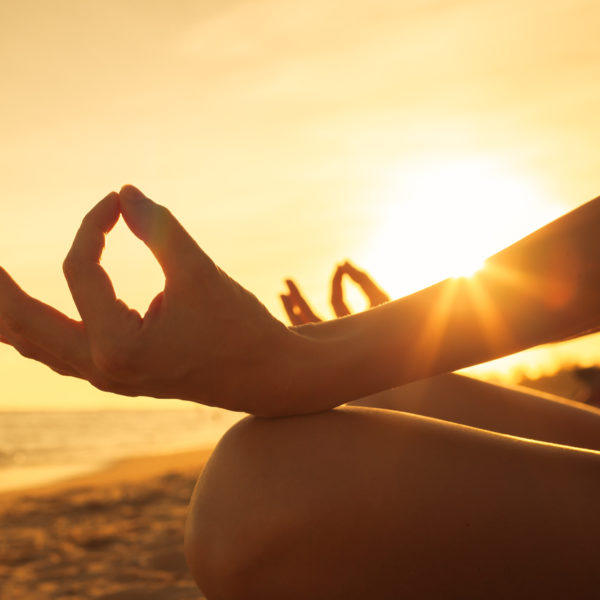 Eczema caused by stress, meditation at sunset on beach, eczema cream, Hope's Relief